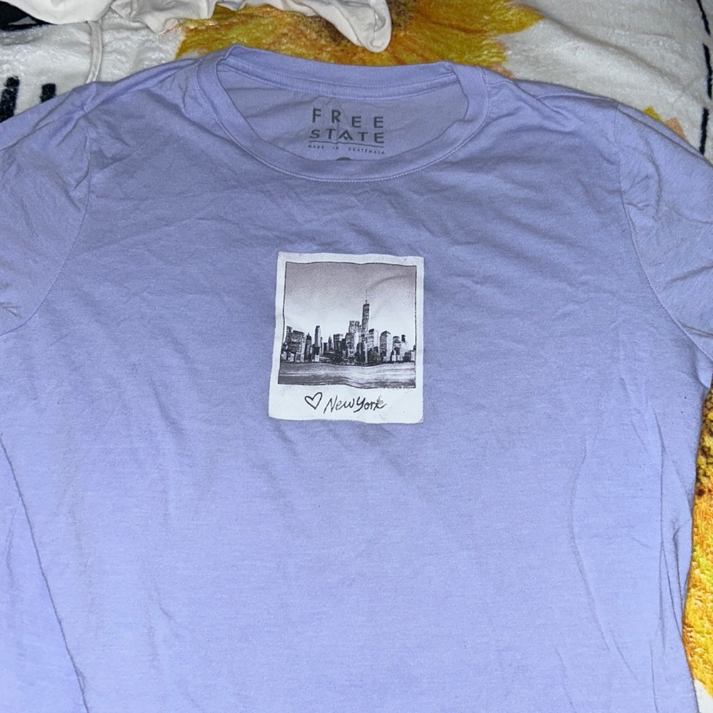 light purple new york tee XLA but fits like medium/large